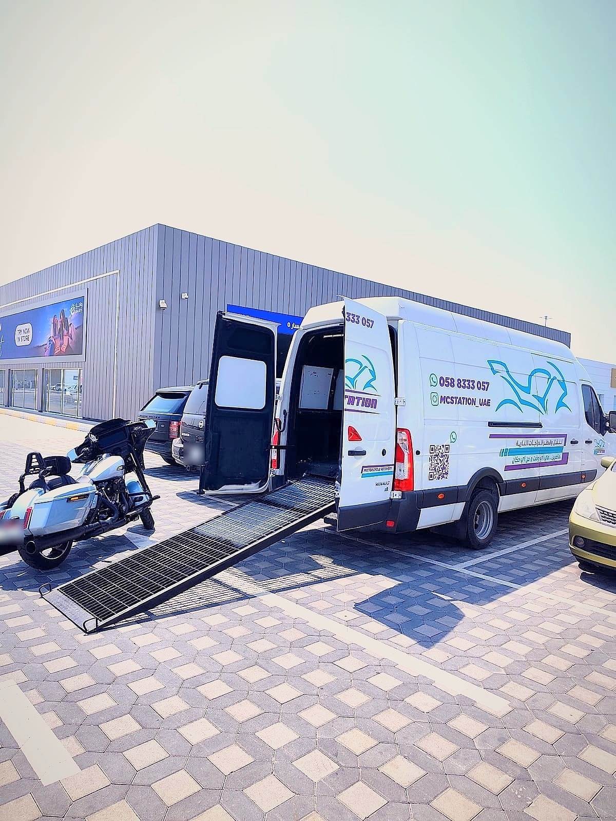 The van with its ramp down at an inspection centre