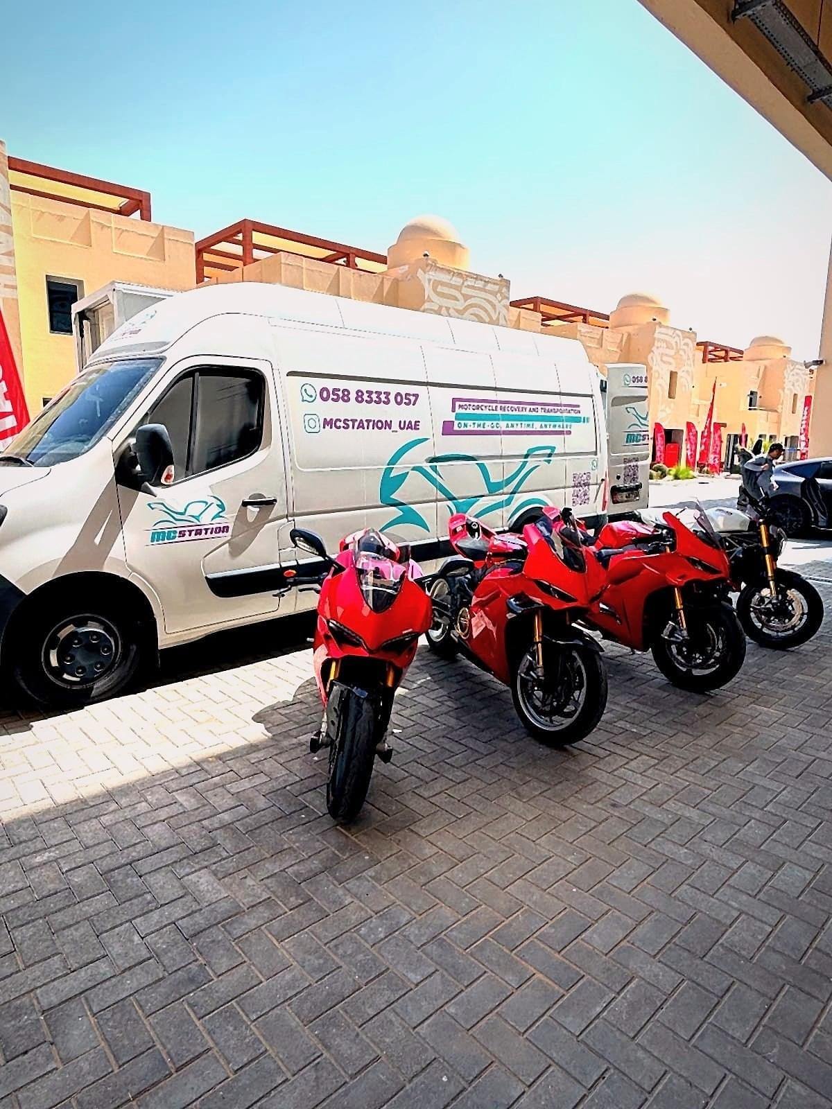 The MC Station van with Ducati superbikes at the track