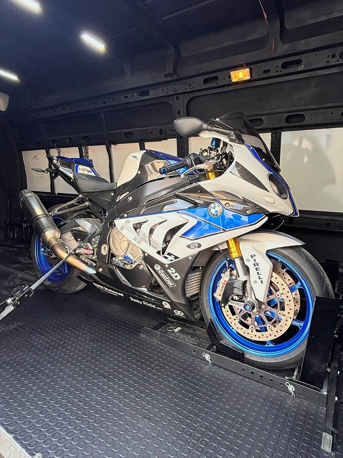 BMW HP4, strapped inside the MC Station van